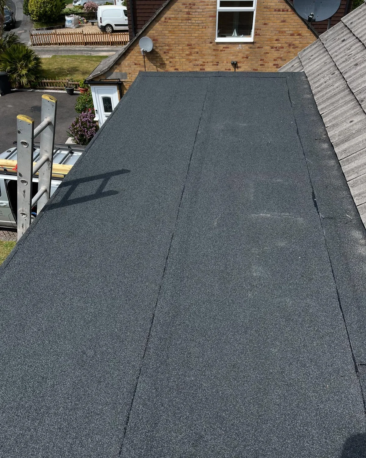 New felt flat roof installation
