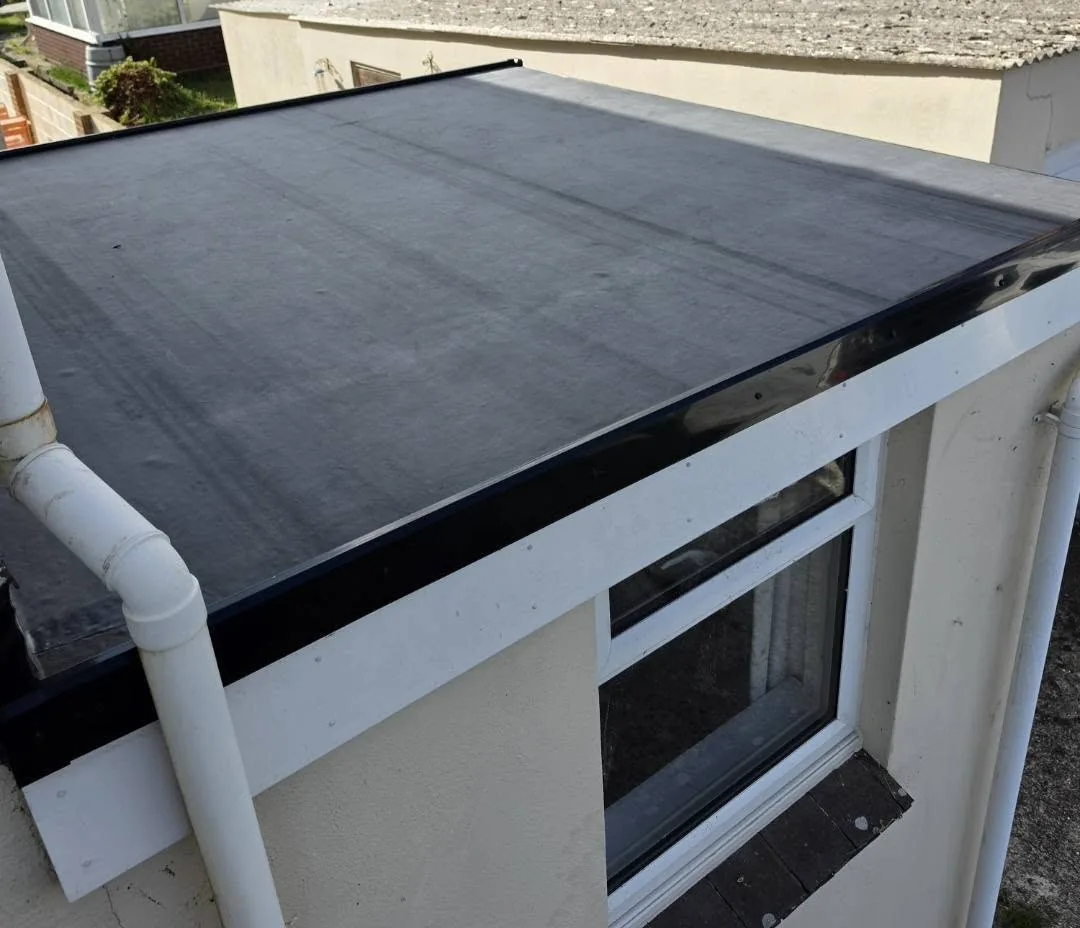 New EPDM rubber flat roof installation