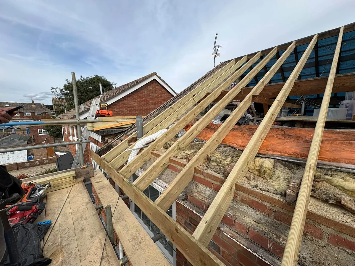 Roof structure undergoing new timber rafter installation