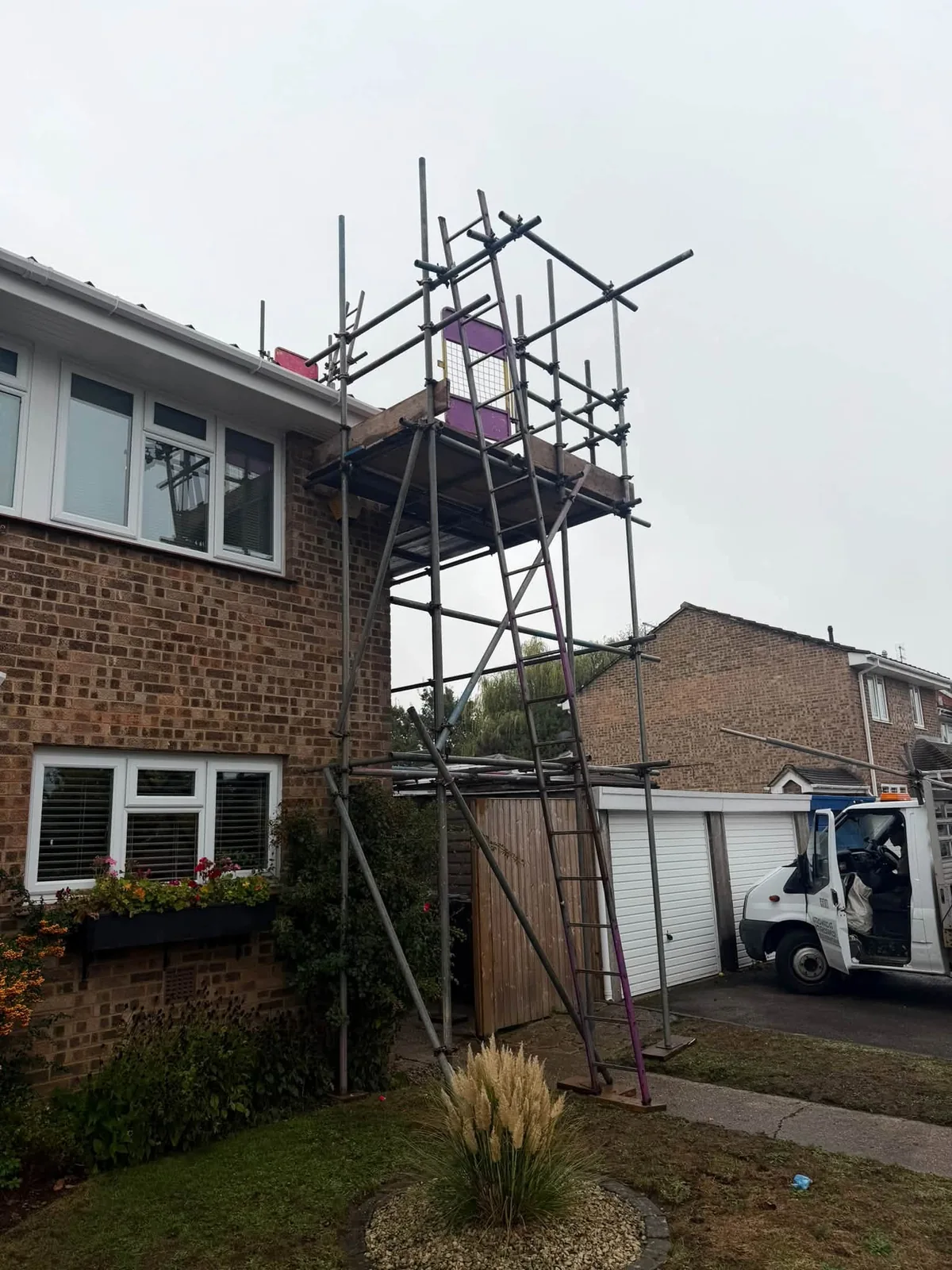 Roof verge repairs with scaffolding set up